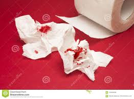 A Photo Of Used Of Bloody Toilet Paper And A Toilet Paper