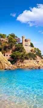 Maybe you would like to learn more about one of these? Castle Of Sant Joan In Lloret De Mar On The Costa Brava In Spain Creativelolo Art Travel Photography Illustrat Spain Photography Costa Brava Spain Costa Brava