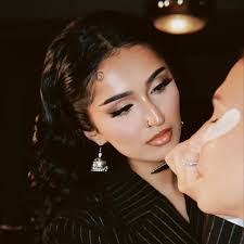 Makeup by Muizza logo