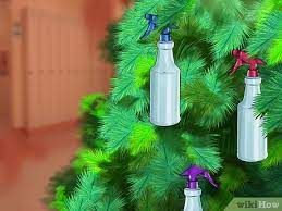 How to keep my cat away from the christmas tree. 3 Ways To Cat Proof Your Christmas Tree Wikihow