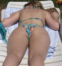Visit /r/creepshots for the real daily creep shots! Teen Sunbathing By The Pool Is Looking Sexy Wearing A Floral Bikini