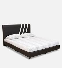 nikko queen size upholstered bed in