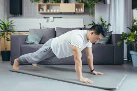 asian performs morning exercises bar on