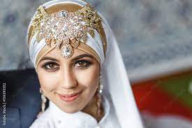 asian muslim bride in white decorated