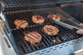 Grilling Classic Burgers On Outdoor Gas