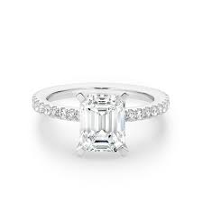 Emerald cut diamonds can be set as the center stone in an engagement ring or used as an accent stone. Emerald Cut Diamond Band Engagement Ring Gregory Jewellers