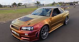 this nissan r34 gt r has a paint job