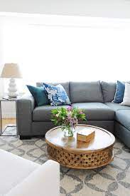Gray Linen Sectional With Blue Pillows