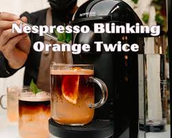 nespresso blinking orange twice why