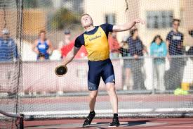 top discus thrower emerges from father
