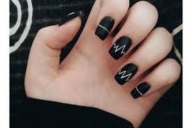 Simply paint your nail in black nail color thereby putting polka dots circling it with number of polkas and again doing the same thing over it. Ten Edgy Black Nail Designs Eve Woman
