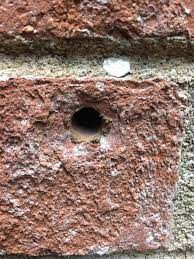 Fill holes in Brick & Mortar - Home Improvement Stack Exchange