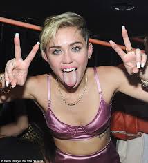 Miley Cyrus Twerks Her Way To Top Of Both Uk Singles And