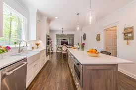 white kitchen with drift wood accent