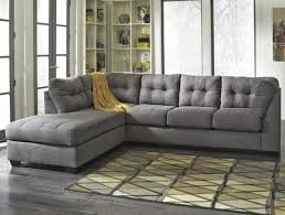 how to place a rug under a sectional sofa