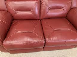 red leather power reclining 2 seater