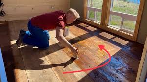 old wood floor in a new off grid cabin