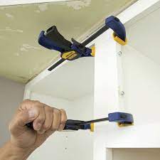Measure the walls, doors and windows to the outside of the moulding. How To Install Kitchen Wall Cabinets Lowe S