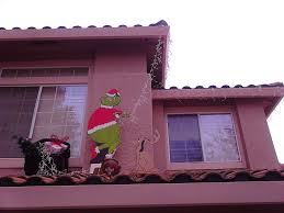 It's always fun to add a little humor to your christmas decoration. Here S An Easy Outdoor Christmas Decoration For The Time Challenged The Grinch Is Easy Outdoor Christmas Decorations Christmas Decorations Outdoor Christmas