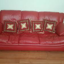 dfs red leather sofa village