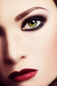 woman with smokey eyes and red lips