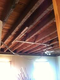 Sometimes you need a little extra space and you need to hang up bigger objects like a bike. Exposed Floor Joist Ceiling