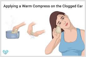 how to unclog ears at home warm