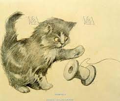 Kitten Playing With A Cotton Reel
