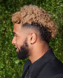Take a look at some of the best curly the style is equally flattering for both young guys and mature curly afro men who embrace and appreciate the natural texture of their hair. 15 Best Haircuts For Black Men Of 2020 According To An Expert