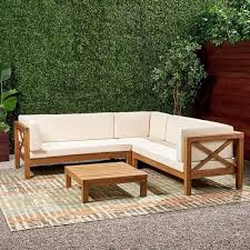 brown rajtai wooden outdoor dining sofa