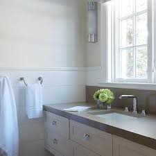 It's about these little mini cabinets we have above our kitchen sink. Window Above Sink Vanity Design Ideas