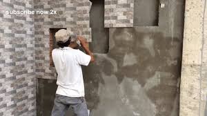 ceramic tiles on brick wall