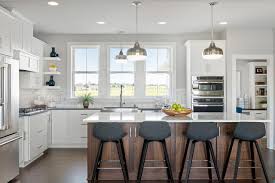 We found seven beautiful white kitchen islands on the us online stores that will look perfect in every white kitchen area. 4 Kitchens With White Cabinets And A Wood Island
