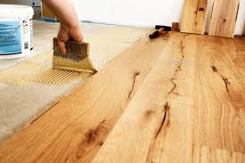 laying finished parquet flooring