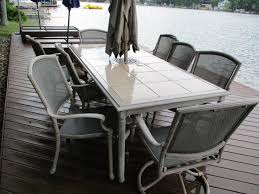 patio table with umbrella and 8 chairs