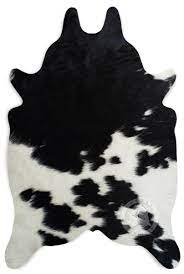 real small cowhide rug black and white