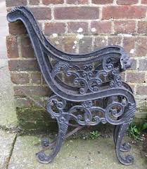 old cast iron lion head garden bench
