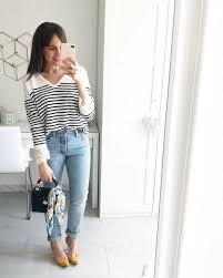 White And Black Striped V Neck With Light Blue Jeans