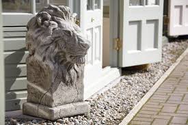 Pair Of African Lions Stone Sculpture