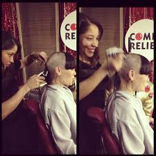 jessie j shaves her head and looks
