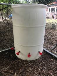 Diy automatic chicken feeder assembly instructions. A 50 Gallon Drum And Four Poultry Watering Cups Will Keep Our Chickens Watered For Days Chicken Waterer Chicken Waterer Diy Chicken Diy