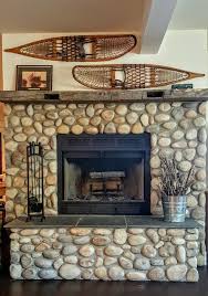 River Rock Mantle In Cabin Fireplace