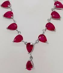 chuck clemency pink red gem pendant