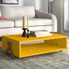 There are drawers both sides providing tucked away storage, which can be a made in portugal this coffee table with storage is good quality and has a range of matching modern furniture too. Wade Logan Jonathon Cross Legs Coffee Table With Storage Reviews Wayfair