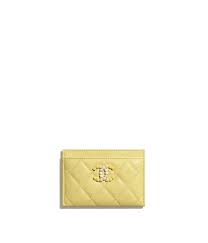 Maybe you would like to learn more about one of these? Grained Calfskin Laquered Gold Tone Metal Yellow Card Holder Chanel