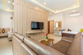 modern living room with brown sofa tv