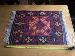 taos new mexico throw rug handmade red
