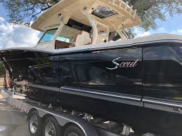 How to Choose the Best Ceramic Coating for your Boat | Beautiful Black  Hulled 38' Scout