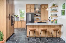 gold and black kitchen with peninsula