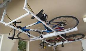 Over at the bmx museum, you'll find out how to make a rack made of pvc pipe. Horizontal Ceiling Bike Rack For Garage Home Interiors Bike Storage Garage Bike Storage Bicycle Storage